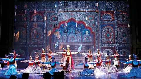 Musical theater performance on stage at Dubai Opera with Broadway-style lighting